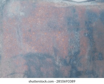 Abstract rusty metal texture background with orange and blue tones corrosion old weathered surface industrial grunge