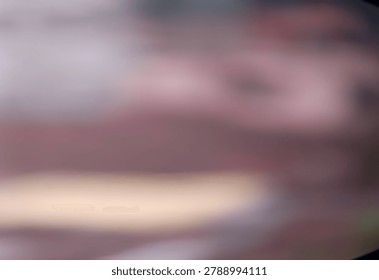 an abstract scene with blurred elements and soft colors, featuring hazy shapes and unclear details in a calm composition.