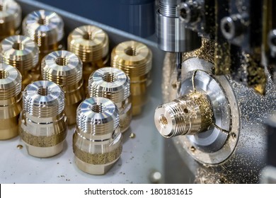 The  Abstract Scene Multi-tasking CNC Lathe Machine Swiss Type And Pipe Connector Parts. The Hi-technology Brass Fitting Connector Manufacturing By Machining Center.