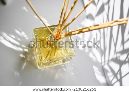 Abstract scent sticks in oil