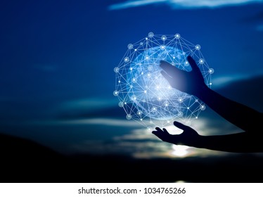 Abstract science, circle global network connection in hands on night sky background  / Blue tone concept - Shutterstock ID 1034765266
