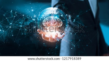 Abstract science. Networking, technology and innovation. Businessman holding brain in circle global network connection communication and data exchanges worldwide on modern interface background. 