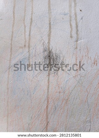 Abstract scribbles on the wall by my child.