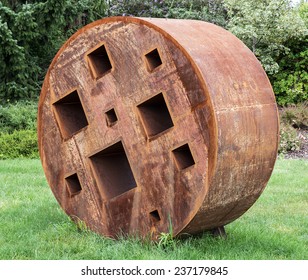 Abstract Sculpture In The Roller Shape In Botanic Garden Prague.