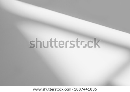 Abstract shadow and striped diagonal light background on white wall  from window,  architecture dark gray and sunshine diagonal geometric effect overlay for backdrop and mockup design