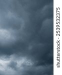 Abstract shapes, patterns and textures of dramatic dark black clouds in the sky. The concept of climate and weather. Natural pattern and tecture background.Copy space.For graphic design or banner 