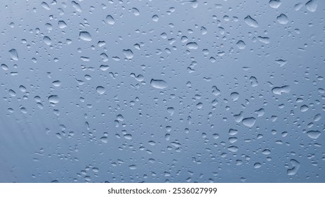 Abstract shapes, patterns and textures of plastic water droplets on a blue sky background. Copy space for graphic design. Natural pattern and texture background. Transparent plastic roof - Powered by Shutterstock