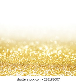 Abstract Shining Glitters Gold Holiday Bokeh Background With White Copy Space