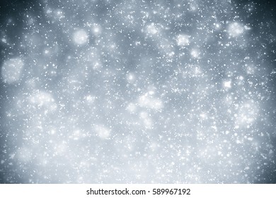 Abstract silver background with white particles. Round bokeh or glitter lights. Design template
