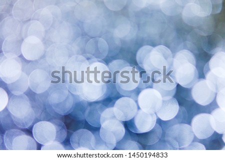 Abstract silver bokeh background, glitter vintage lights background, blurred beautiful shiny lights, Christmas and Happy new year Concept background               