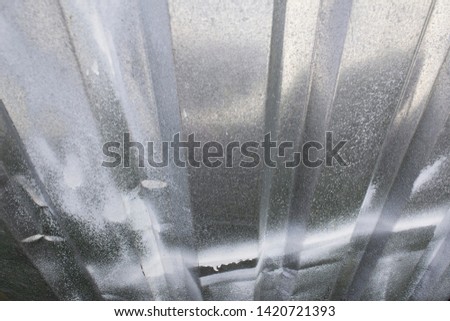 Abstract silver grey metal lines of textured surface with white color painting