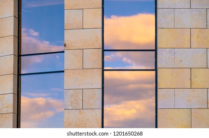 Abstract sky reflection on facade
