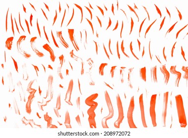 Abstract Smears Of Orange Paint On White Background