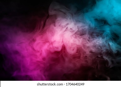 Abstract smoke steam moves on a black background . The concept of aromatherapy.