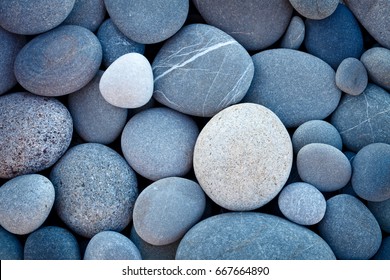 Abstract smooth round pebbles sea texture background