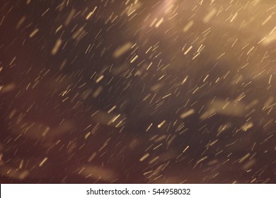 Abstract Snowstorm texture. Falling snow. Light flashes and bokeh. Sun rays. Lens flare. For use as texture layer in your project. Add as "Lighten" Layer in Photoshop to add falling snow any image.