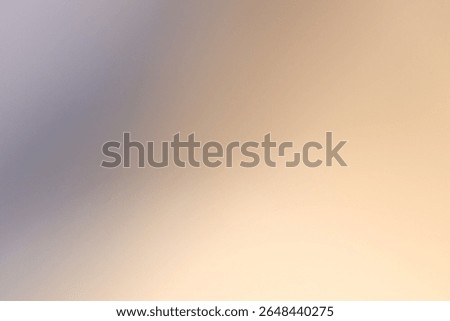 Abstract soft gradient background with warm neutral tones.