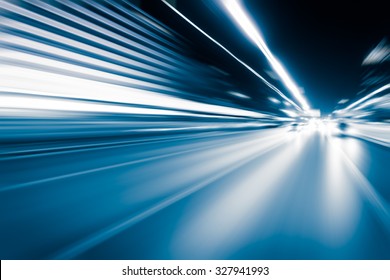 Abstract Speed Motion In Highway Road Tunnel, Blurred Motion Toward The Central