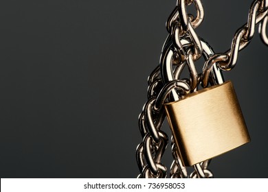 abstract stainless steel chain and padlock, security concept