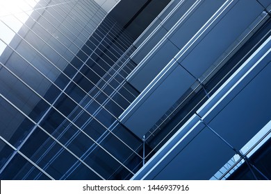 Abstract Steel And Glass Facade Detail Background Of High Rise Commercial Building .Business Or Industrial Successful Concept Background .