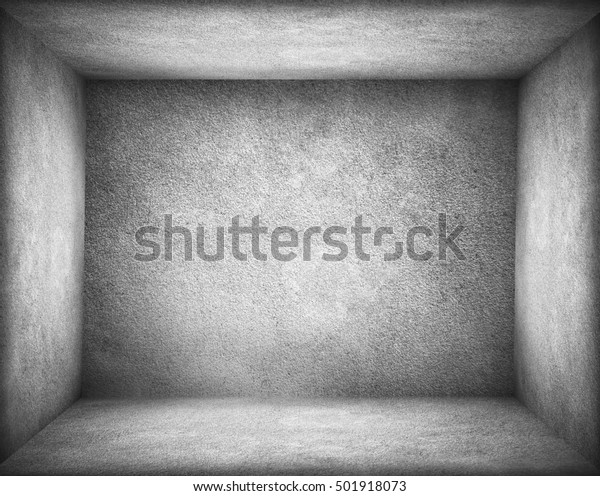 Abstract stonework background texture with old\
weathered dark stucco black paint stone cement wall in rural room.\
Grungy cold rock surface in hard grime empty place with gray\
granite dull light\
floor.