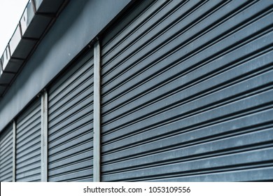 Abstract stripe pattern of metallic roller shutter doors or rolling steel doors background.