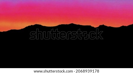 An abstract  sunset panoramic  over the San Jacinto mountains in Palm Desert's Coachella Valley. The foreground was underexposed to focus attention on the sky. In was silhouetted in post production.