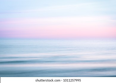 Abstract sunset sky and  ocean nature background with blurred panning motion.