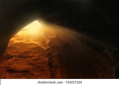 Abstract and surrealistic image of cave with light. revelation and open the door, Holy Bible story concept. - Shutterstock ID 724257103