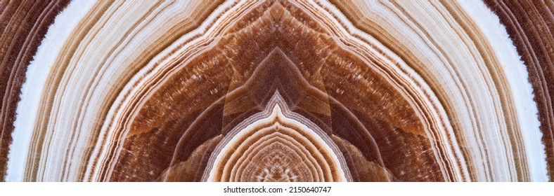 Abstract symmetric pattern of marble onyx polished slice. Amazing patterns and textures of slice of minerals for background. The image with mirror effect - Shutterstock ID 2150640747