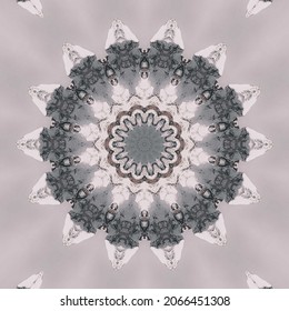 Abstract symmetrical patterns are suitable for use as backgrounds and wallpapers. An image with a mirror effect from a photo and has diverse and beautiful colors. kaleidoscopic abstract pattern.