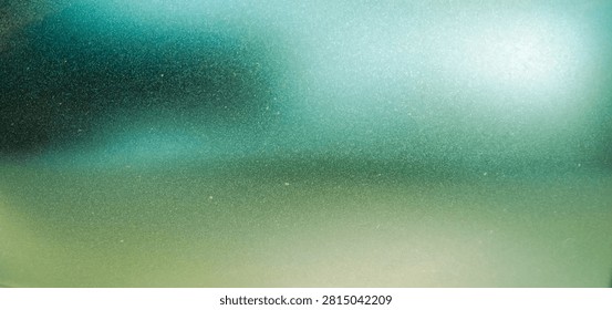 Abstract teal and green gradient background with fine speckle texture and soft ambient lighting for modern artistic concepts