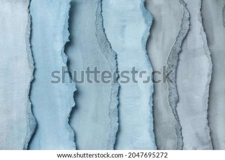 Abstract texture background. Layers of watercolor painted paper. Torn edges.