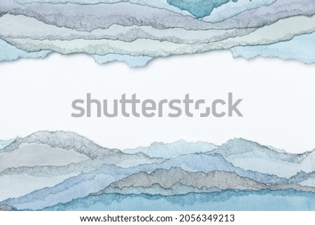Abstract texture background. Layers of watercolor painted paper. Torn edges.