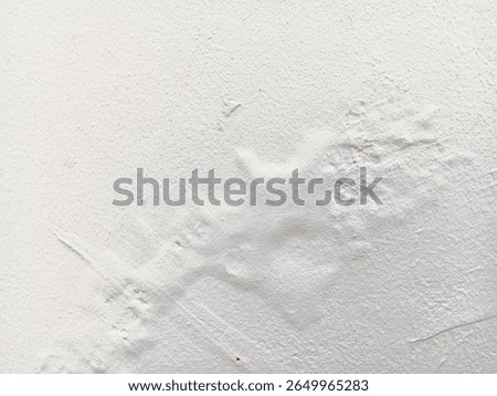 Abstract texture of blistering or bubbles paint on a white wall.	