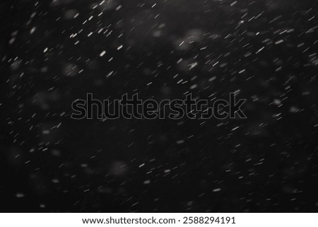 Abstract texture. Falling snow isolated on black background. Layer to overlay and blend snowfall into your photo project.	