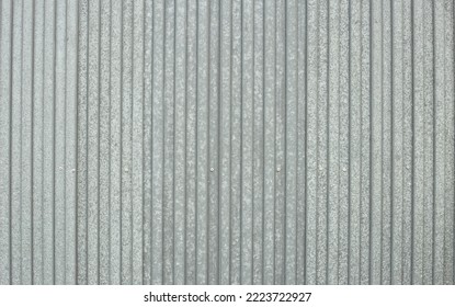 A Abstract texture of galvanised metal and vertical lines. An antique metal material texture for your design.