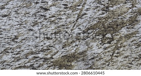 Abstract texture of rough cement wall with splashes of mud stains