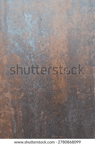 Abstract textured replicating old rusted steel sheet or dark ceramic tile surface. Heavy material backdrop with scratches and corrosion marks. Industrial grunge background with oxidized metal effect