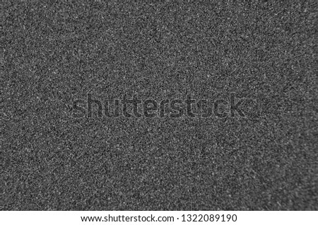 Abstract textured sandpaper, close up as background