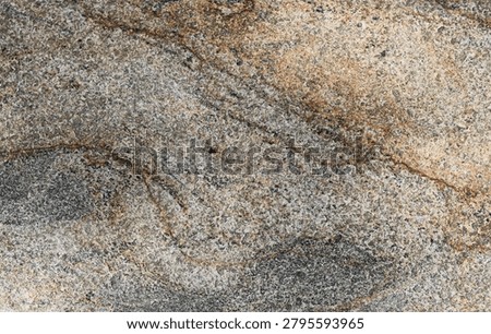 Abstract textured stone background featuring a blend of grey, warm tan, light beige, and thin veins of rusty brown, with natural grain patterns, speckles, and subtle surface cracks.
