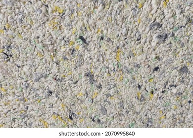 Abstract textured wallpaper. Decorative texture. Colored texture of liquid wallpaper to cover wall surface. Colored abstract background. Abstract texture of decorative plaster liquid wallpaper