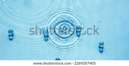 Abstract transparent water background with ripples in the form of an eye