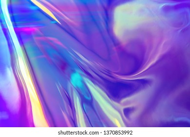 Abstract Trendy Holographic Background In 80s Style. Real Texture In Violet, Pink And Mint Colors With Scratches And Irregularities. Synthwave. Vaporwave Style. Retrowave, Retro Futurism, Webpunk