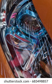 abstract type headlights of the vehicle, note shallow depth of field