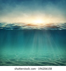 Abstract underwater background with sunbeams - Shutterstock ID 196206158