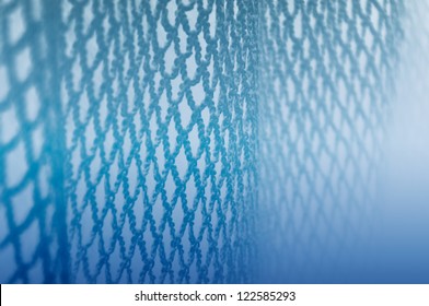 Abstract Underwater Blue Fishing Net