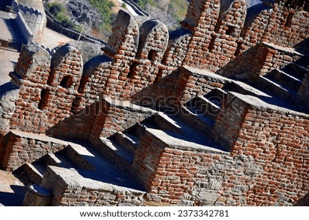 Abstract of Unique brick staircase structure. Can be seen in palaces or fort of India from early 14-15th centuries. Watch tower is built to keep the watch and attack from top on enemies and invaders.