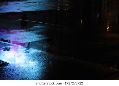 Abstract urban history, Lights and shadows, streets after rain with reflections on wet asphalt., horizontal image with blurred background, free space for text, defocus blurred