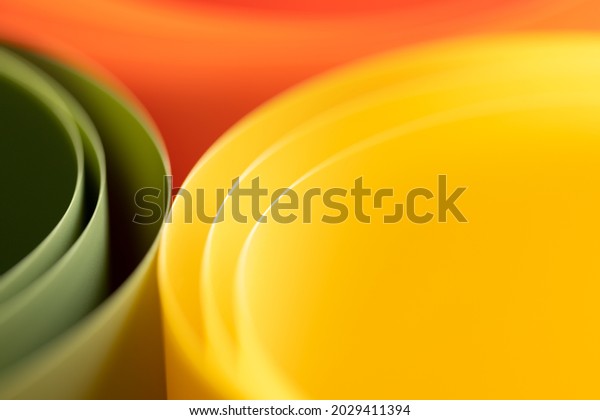 abstract vibrant color curve background, creative\
graphic wallpaper with orange, yellow and green for presentation,\
concept of dynamic movement and space, bending plastic sheets,\
selective focus